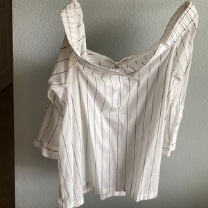 Off the shoulder light weight summer top! Cute button detail down the back